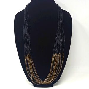 Elegant Multi-Strand Black and Gold Necklace